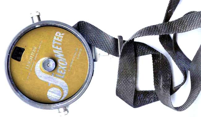 Leighton flexometer showing dial and strap attachment for measuring joint range of motion